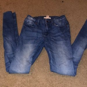 Jeans Worn a few times. No holes are problems with them. Skinny legged.